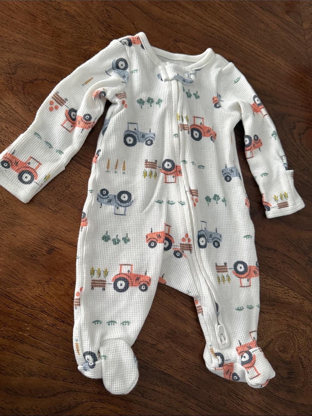 Carter's White Footed One-Piece with Orange and Blue Tractor Print